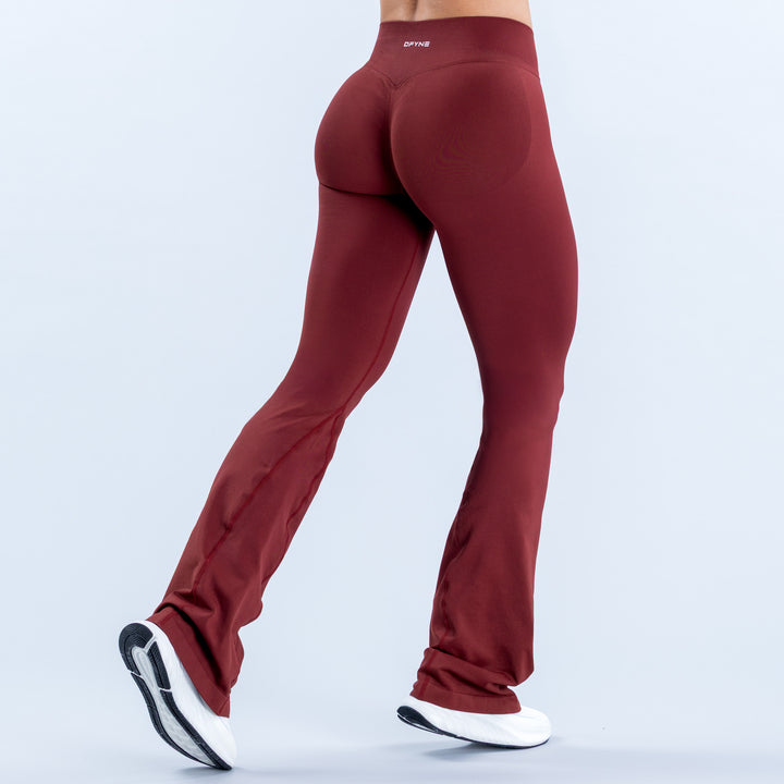 Burgundy flared leggings, rear view with a high waistband