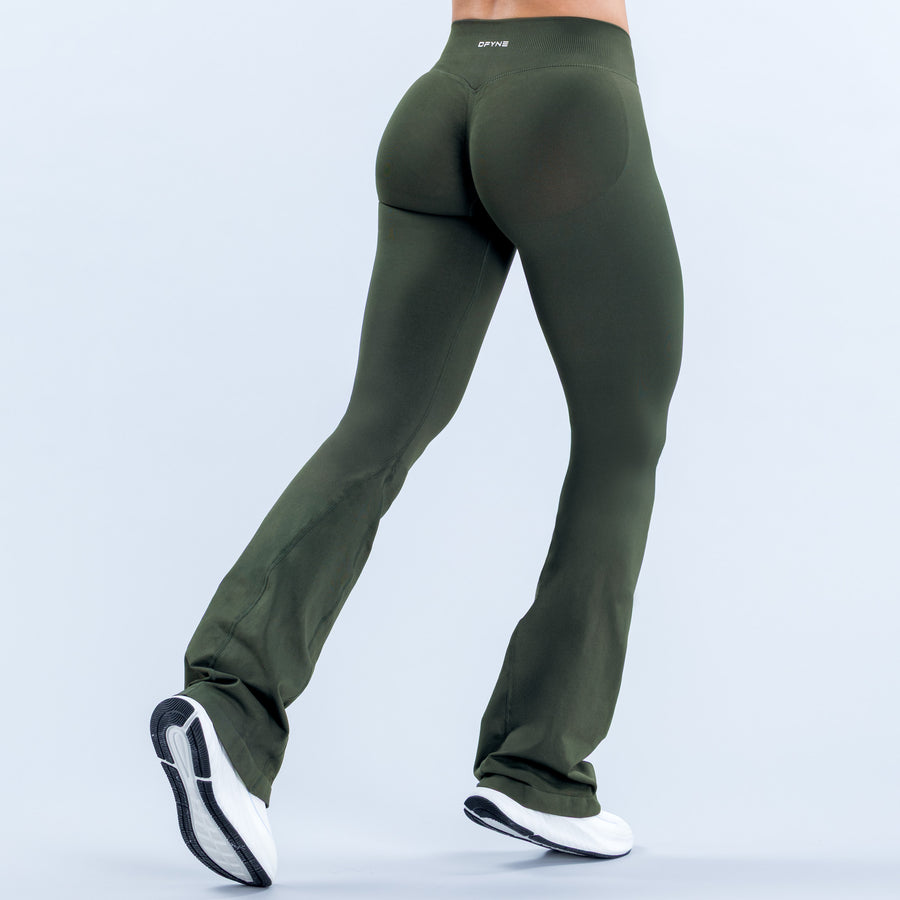Dark green flared leggings shown from the back, with a high waistband.