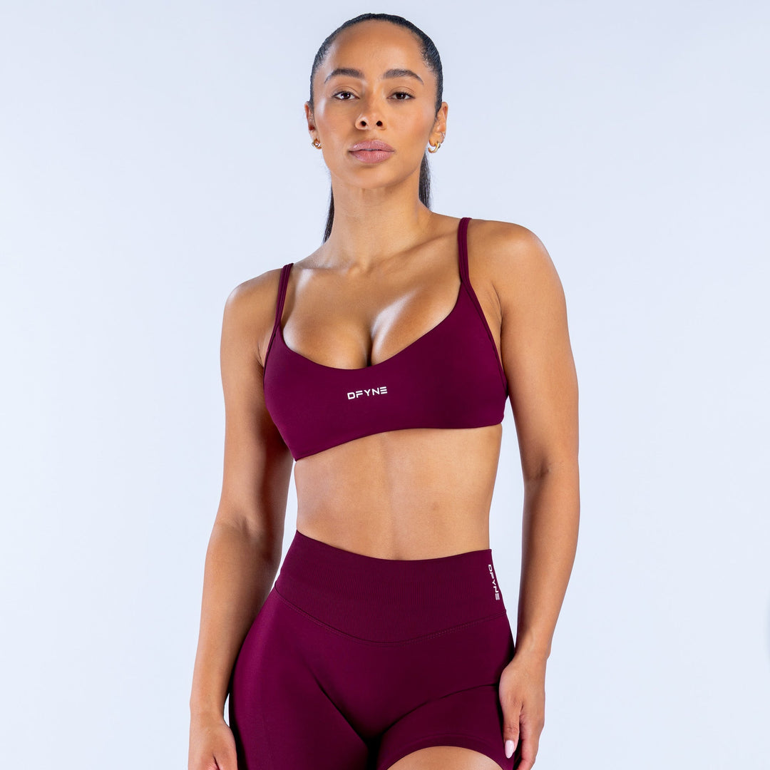 Burgundy scoop-neck sports bra with thin straps