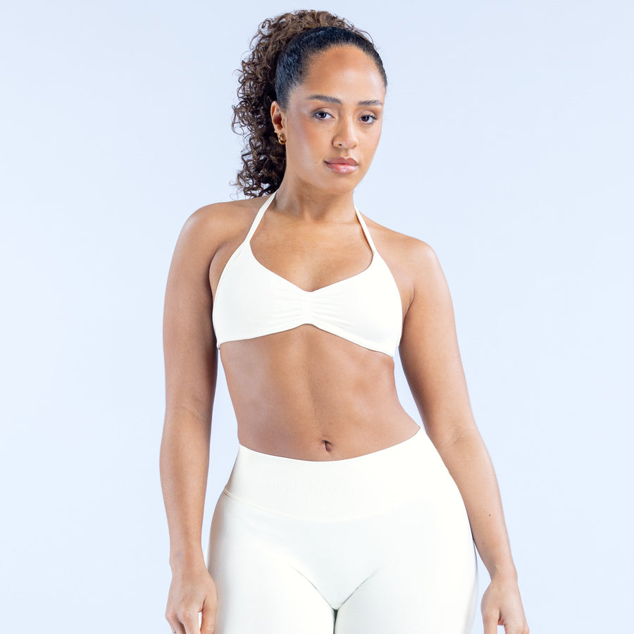 White strappy bra with V neckline and racerback straps