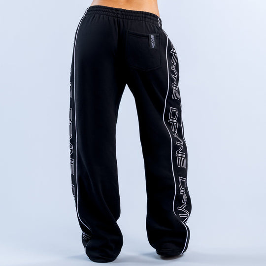 Black wide-leg joggers with elastic waist, back pocket, and white side text print