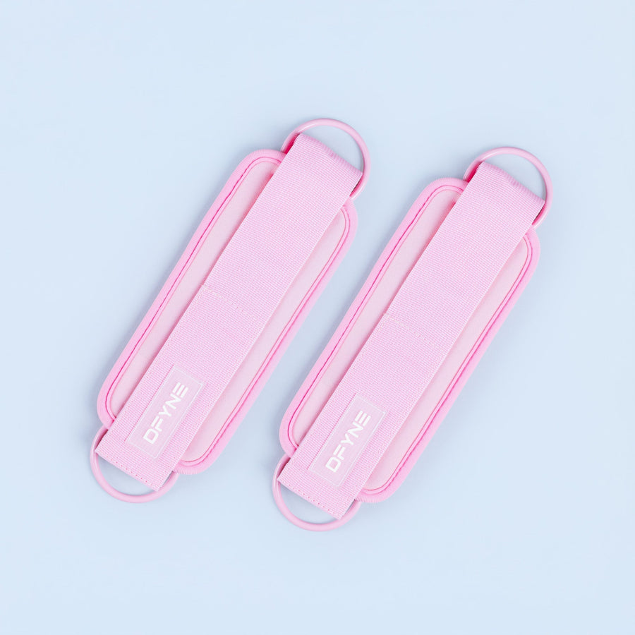 Pink ankle straps with Velcro closure and padded fabric webbing