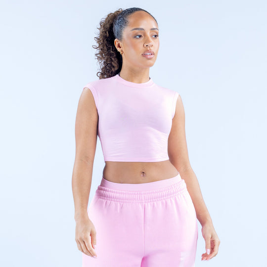 Lilac sleeveless cropped baby tee with crew neck and smooth jersey fabric