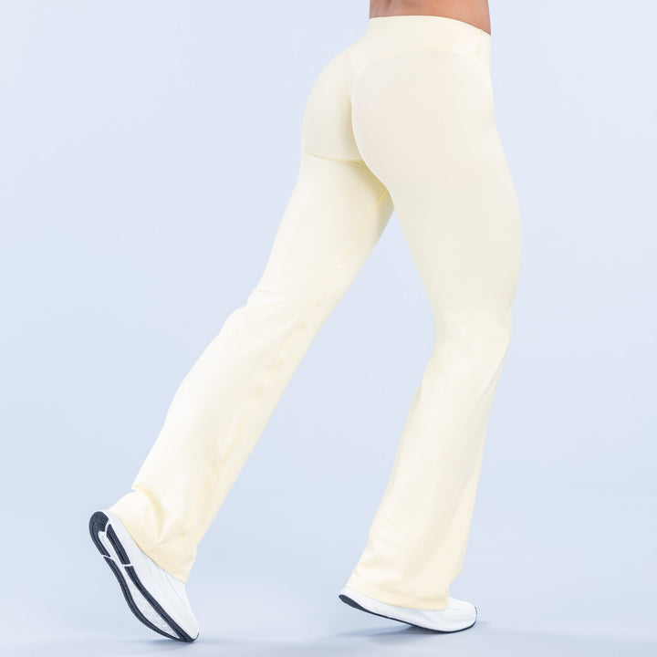 Light cream flare pants, side view, relaxed wide-leg silhouette
