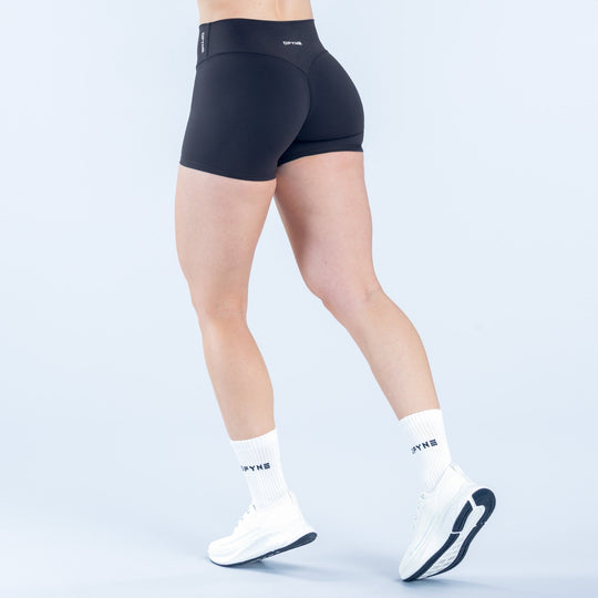 Origin shorts, dark black mid-rise athletic boxer-style with waistband logo