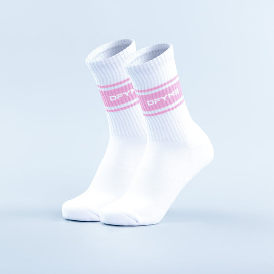 White crew sports socks with pink stripe bands and ribbed cuff