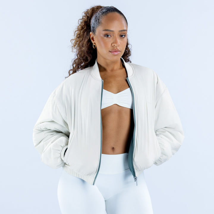 Reversible bomber jacket, white with front zipper and ribbed cuffs