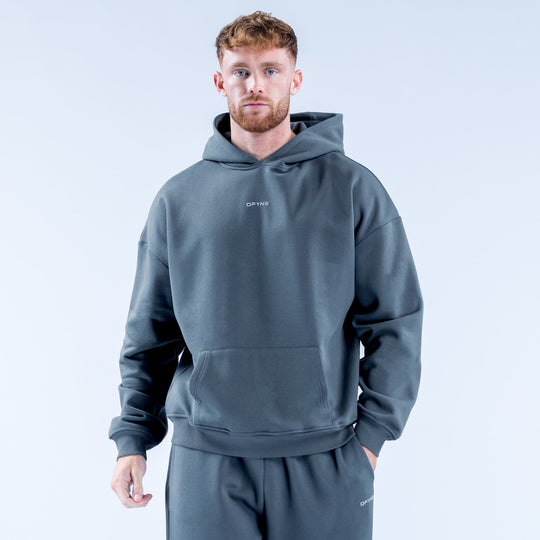 Slate blue graphic hoodie with front pocket and small chest logo