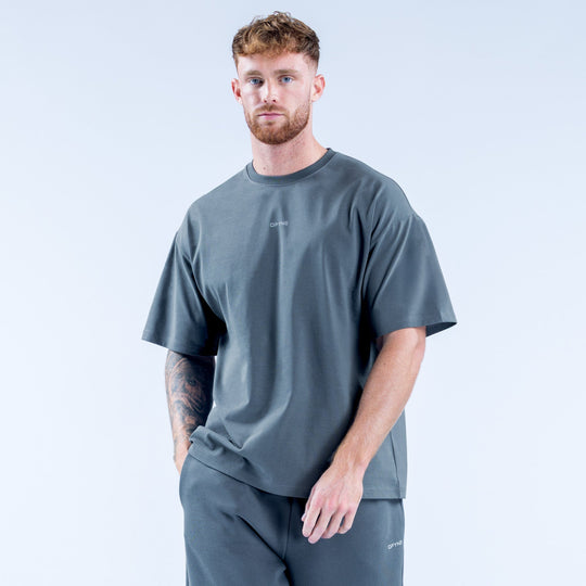 Men's dark gray graphic t-shirt with small chest logo