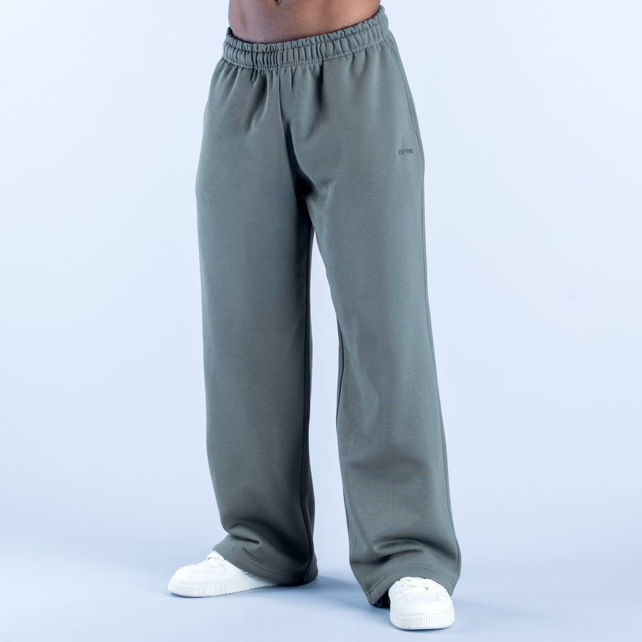Sage green straight-leg joggers with elastic waistband and clean straight hem