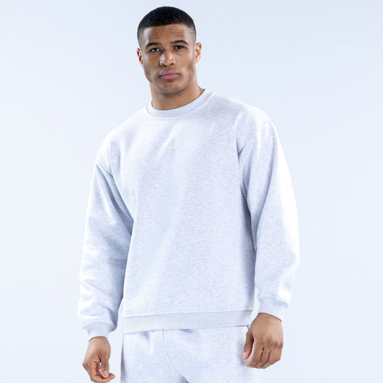 Light heather gray crewneck sweatshirt with long sleeves and ribbed cuffs