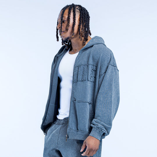 Washed blue zip hoodie with hood and kangaroo pocket, side view