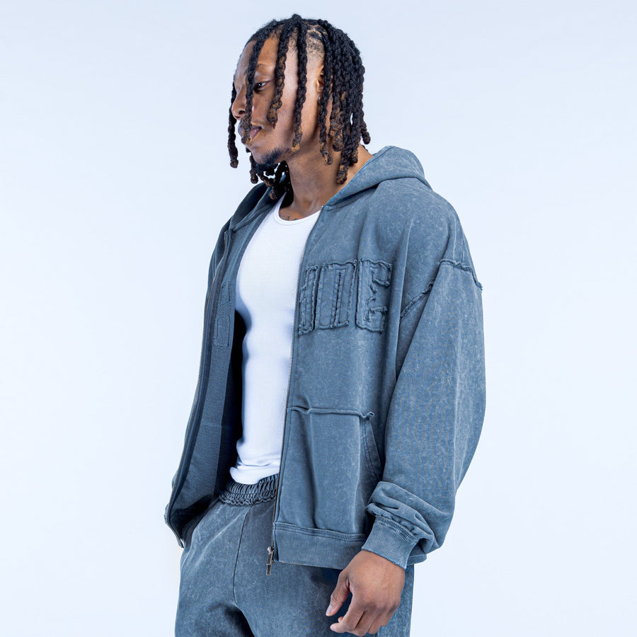Washed blue zip hoodie with hood and kangaroo pocket, side view