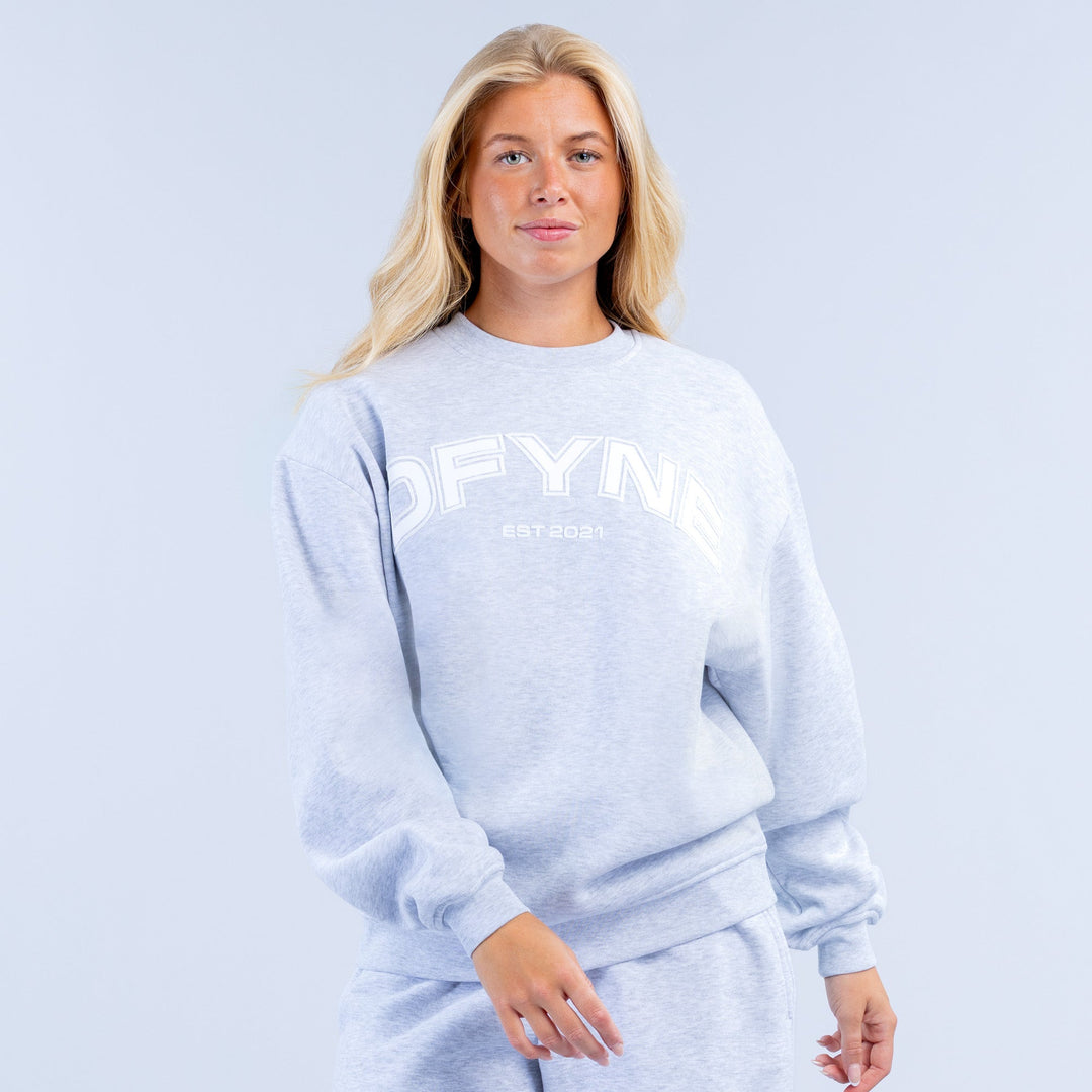 Light blue graphic sweatshirt with DEFYN logo and crew neck