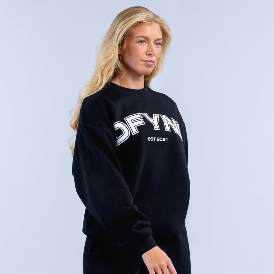 Black graphic sweatshirt with OFYNE logo and EST 2021 on chest