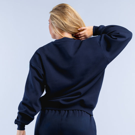 Navy crewneck sweatshirt with plain back, ribbed cuffs and elastic waistband