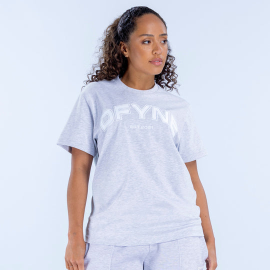 Light gray oversized graphic T-shirt with crew neck and short sleeves, front logo