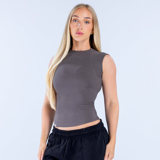 Dark gray ribbed sleeveless top with high neck, backless design
