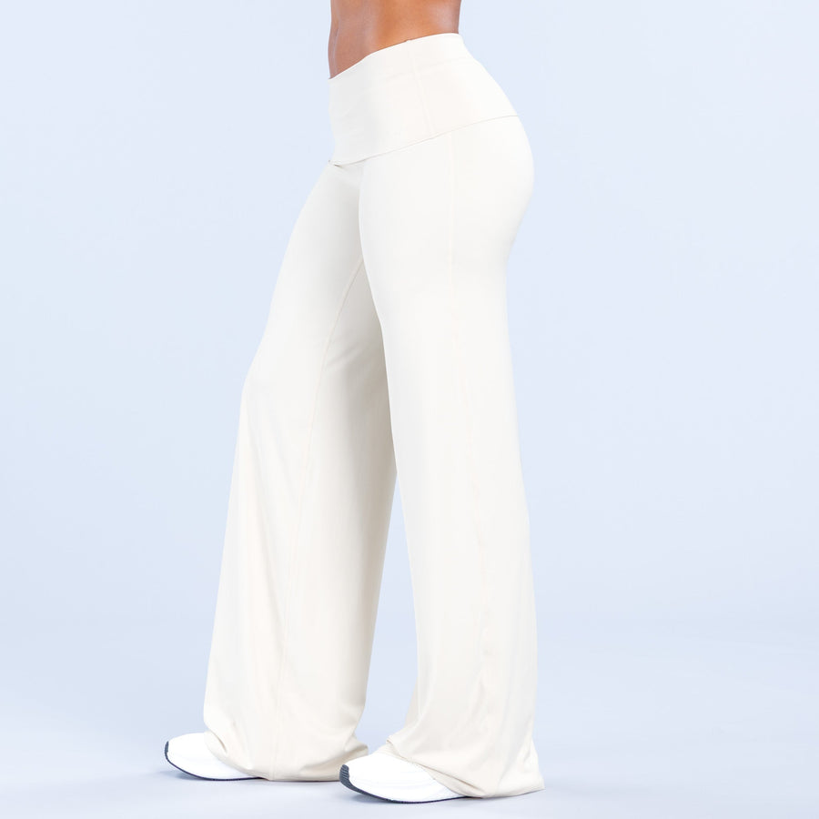 White fold-over wide-leg pants with wide waistband and flowing wide hem