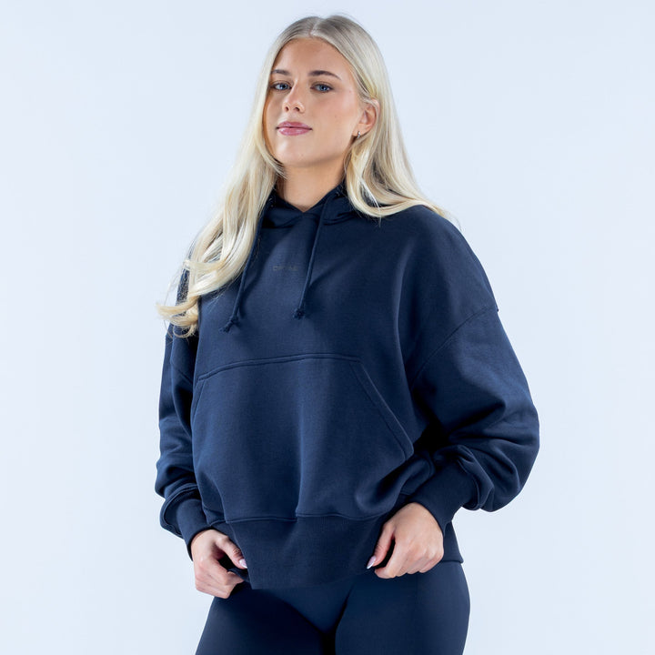 Women's dark navy pullover hoodie with drawstring hood and front kangaroo pocket