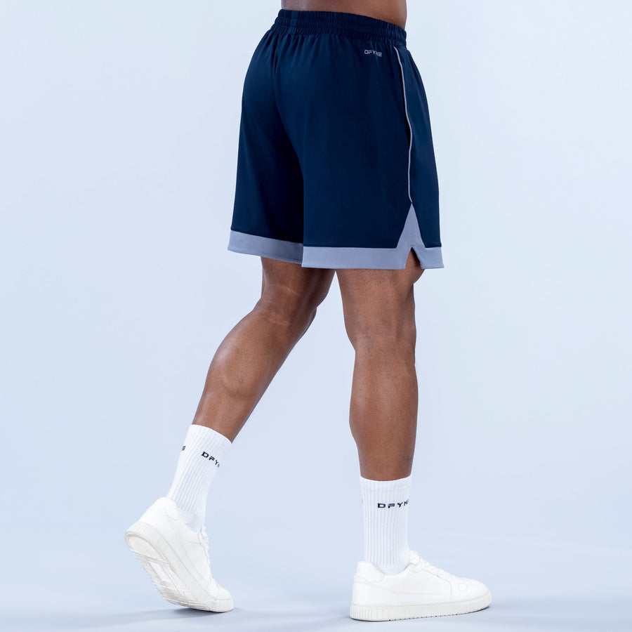 Navy jersey shorts with elastic waistband, light gray hem, relaxed fit