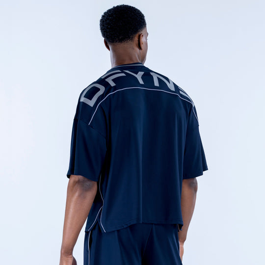 Navy jersey with crew neck, short sleeves, and white striped back lettering