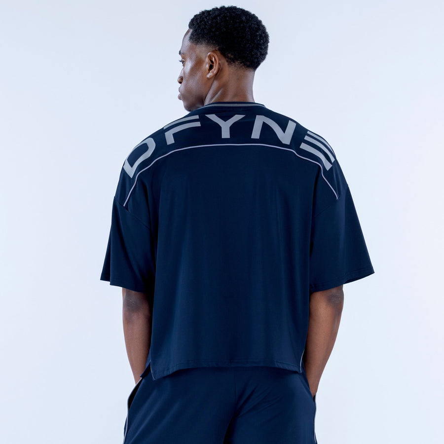 Navy jersey with crew neck, short sleeves, and large white back lettering graphic