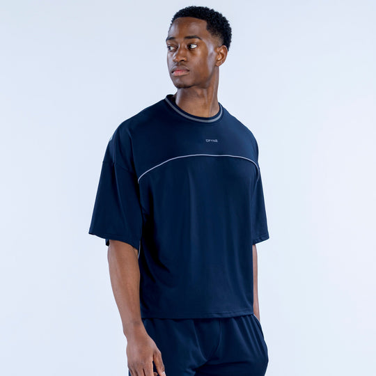 Navy crew-neck jersey with short sleeves and thin white curved chest panel