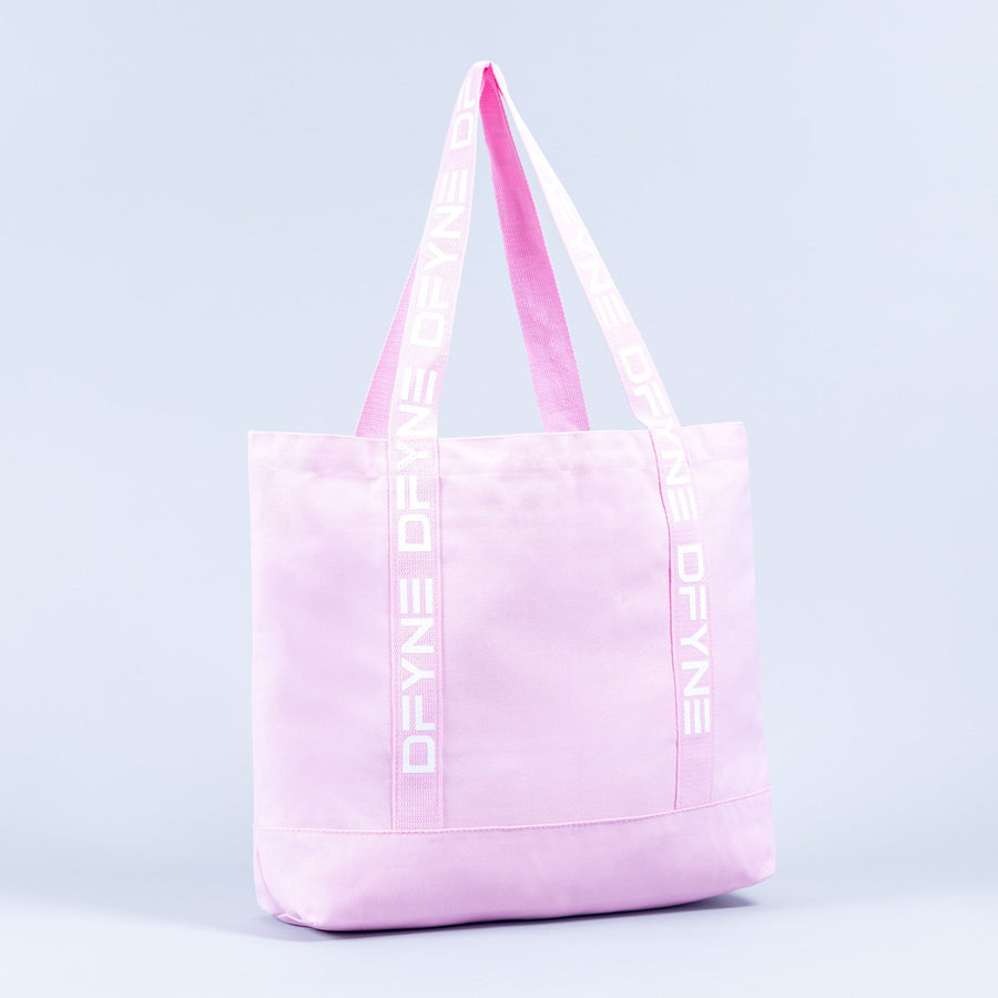 Light pink tote bag with logo handle tape and front panel seam detail.
