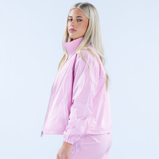 Pink track jacket side view with full-zip and stand collar, elastic cuffs
