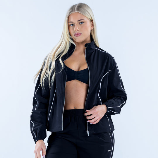 Women's black track jacket with full zip front and white piping details