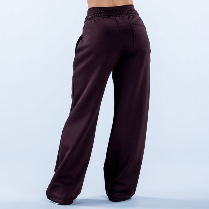 Dark maroon wide-leg jogger pants with elastic waistband and side pockets, relaxed straight fit