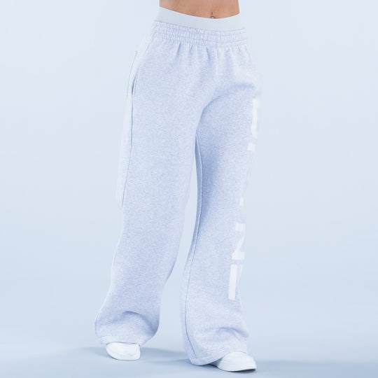Light blue wide-leg jogger pants with elastic waistband and bold back graphic
