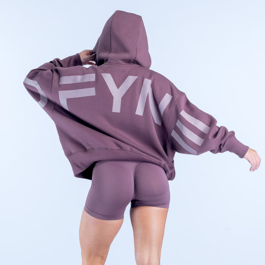 Mauve hoodie with large back “HY” graphic, hood up, kangaroo pocket, long sleeves