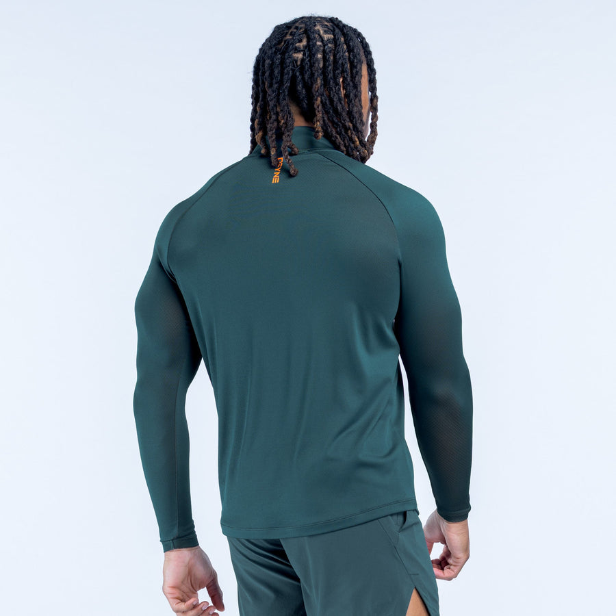 Teal quarter-zip athletic top, back yoke and long sleeves