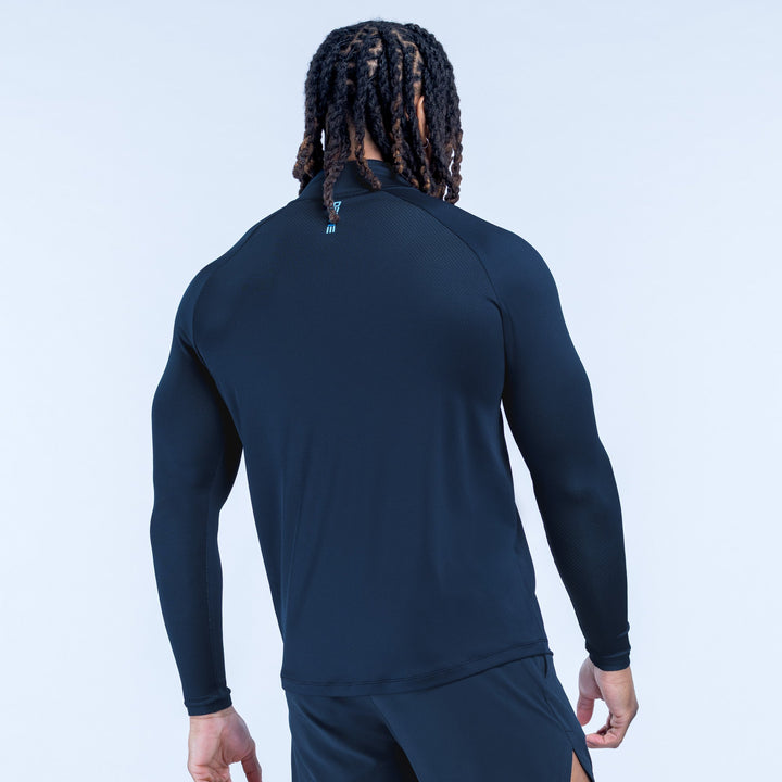 Dark navy quarter-zip pullover with long sleeves and back hem logo detail