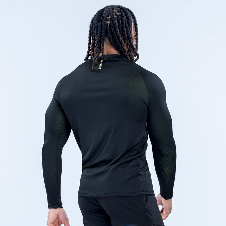 Black long-sleeve training T-shirt from back view, with small back logo.