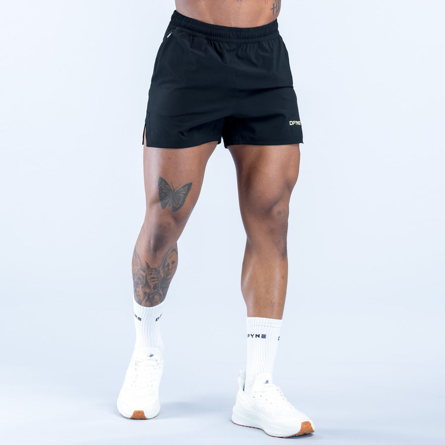 Men's black training shorts with elastic waistband and small side logo, above-knee