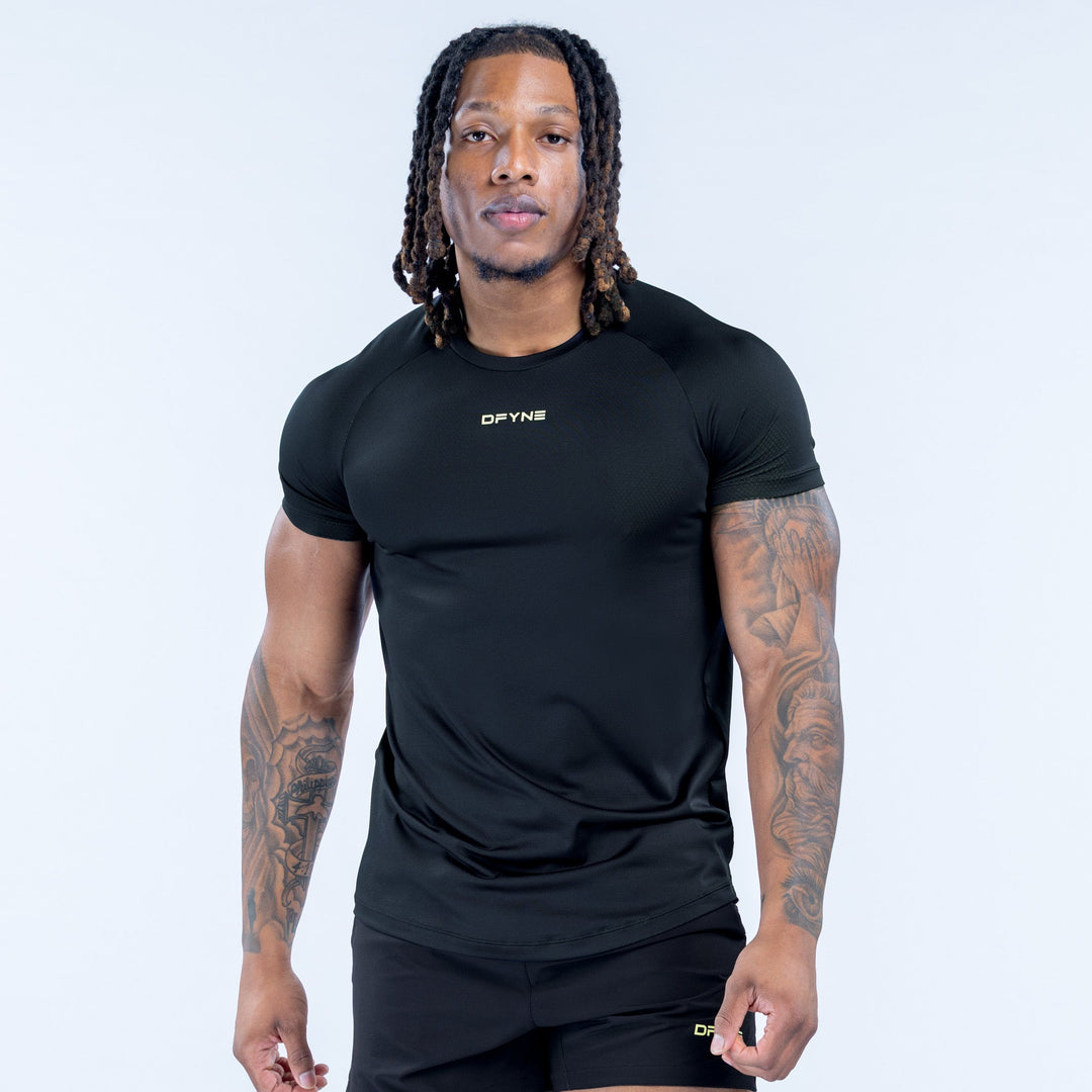 Black training T-shirt with short sleeves and crew neck, small chest logo
