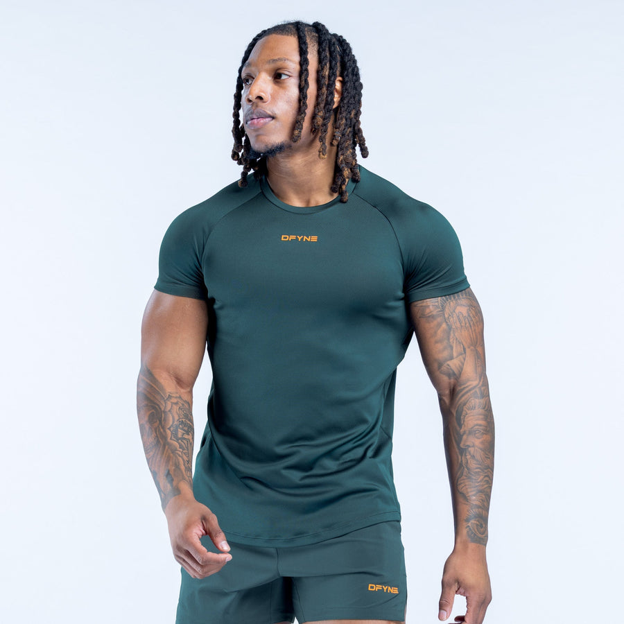 Men's dark green training T-shirt, front view with chest and hem logos