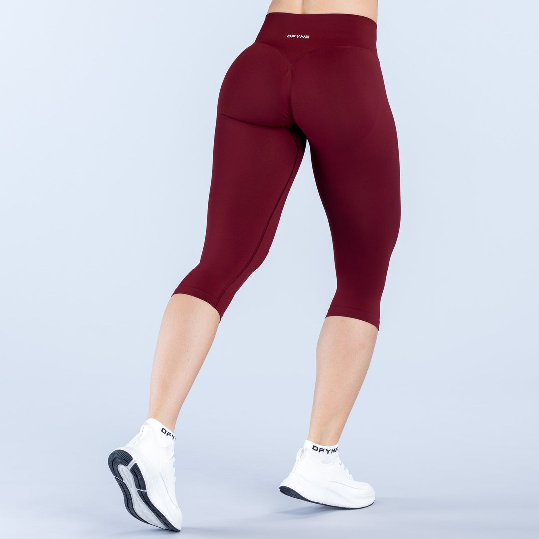 Vision capri pants with straight waistband, burgundy stretch knit, back view, 3/4 length
