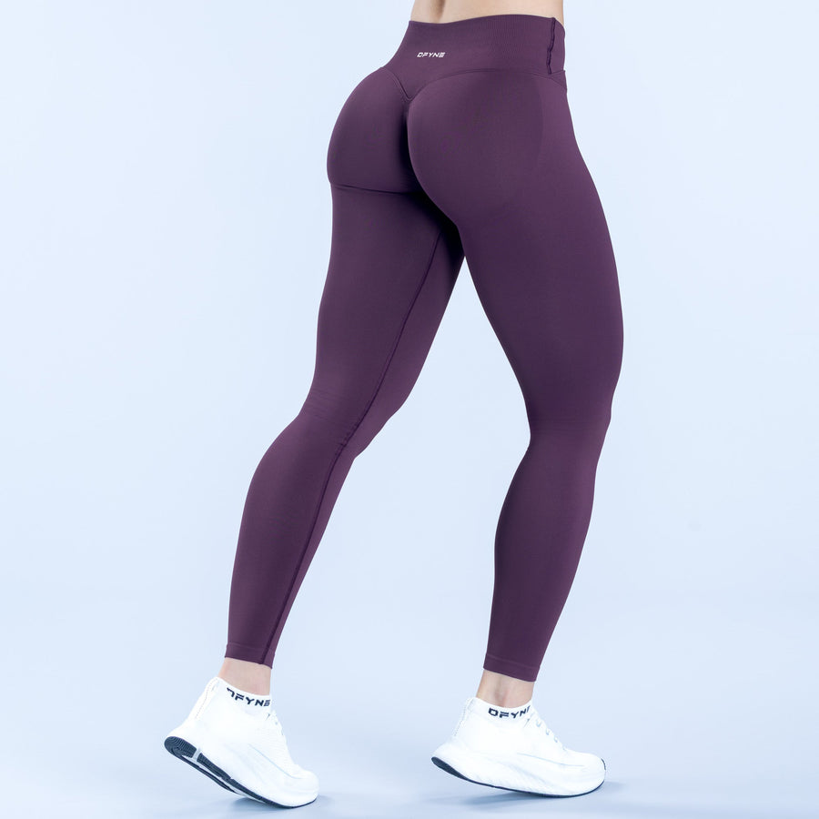 Dark purple high-rise full-length leggings with smooth stretch fit and side logo